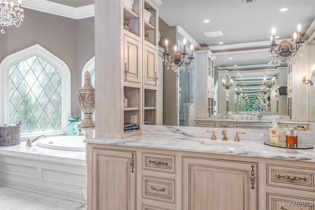 full bath featuring ornamental molding, vanity, a bath, and a notable chandelier