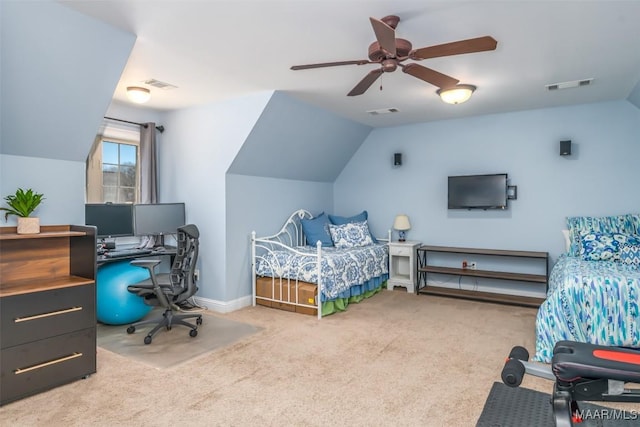 bedroom with visible vents, lofted ceiling, and carpet flooring