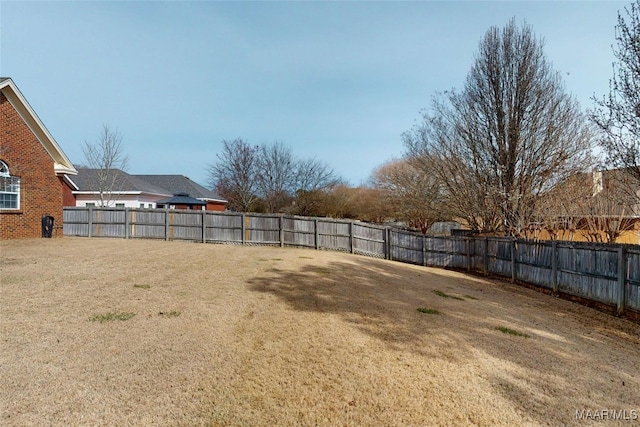 view of yard with fence