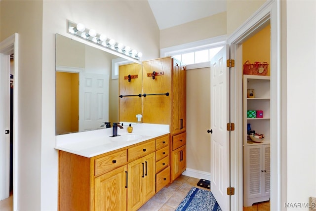 bathroom featuring tile patterned floors and vanity