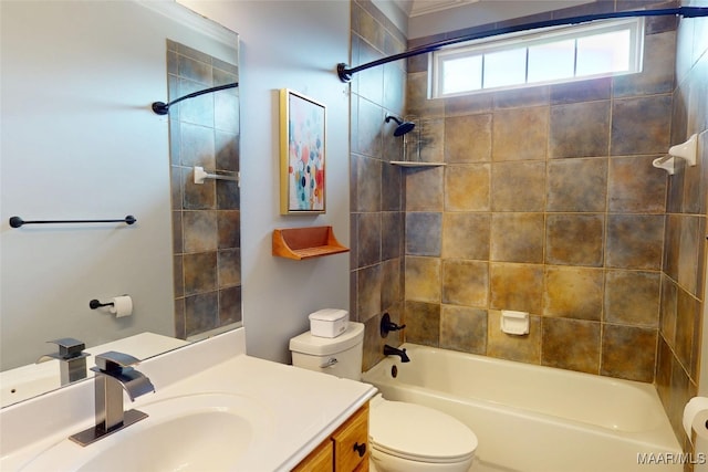 bathroom featuring shower / bathing tub combination, toilet, and vanity