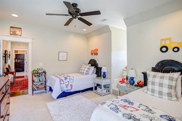 bedroom with a ceiling fan, recessed lighting, light colored carpet, and visible vents