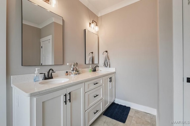 full bath featuring crown molding, double vanity, baseboards, and a sink