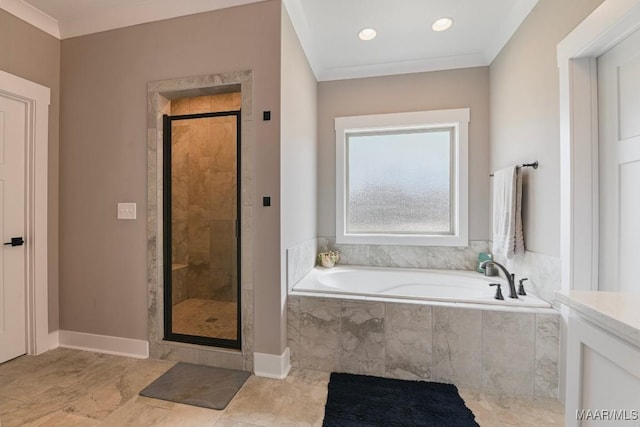 bathroom featuring a shower stall, a bath, and baseboards