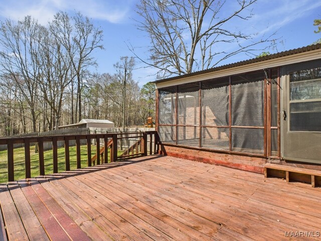 wooden terrace with a sunroom