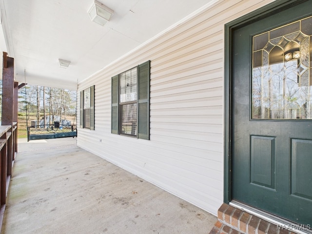 property entrance with a porch