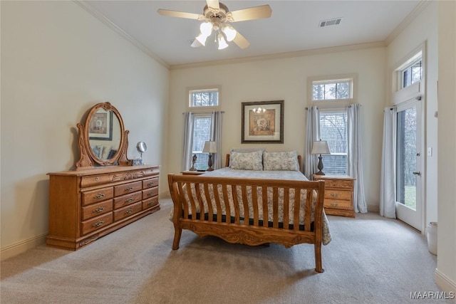 bedroom featuring crown molding, multiple windows, light colored carpet, and visible vents