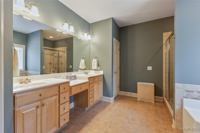 full bathroom featuring tile patterned flooring, a garden tub, double vanity, a stall shower, and a sink