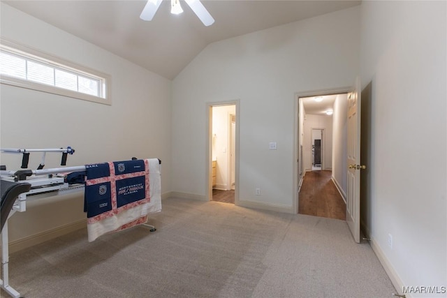 recreation room featuring carpet flooring, baseboards, lofted ceiling, and a ceiling fan