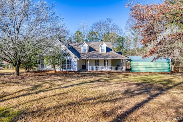 view of front facade with a porch and a front yard