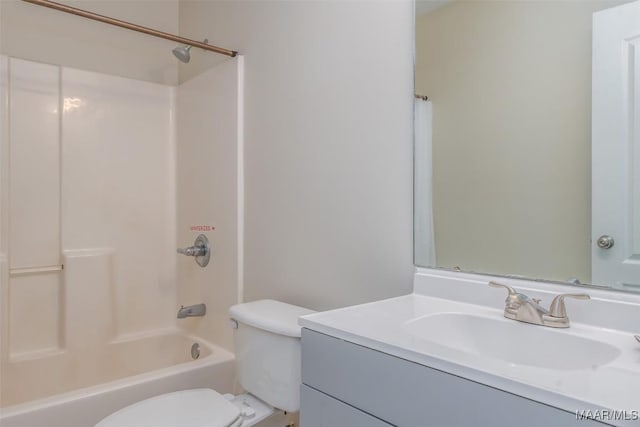 full bathroom with tub / shower combination, toilet, and vanity