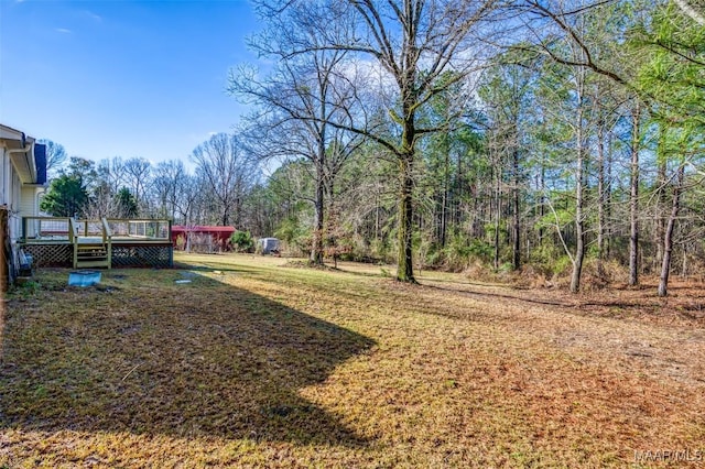 view of yard with a deck