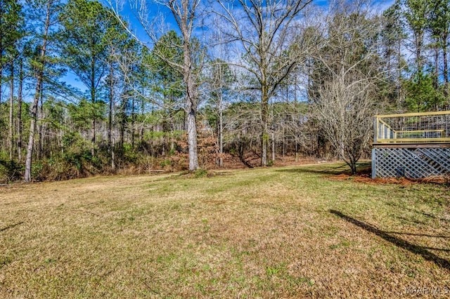 view of yard with a deck