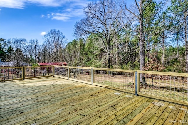 deck with a wooded view