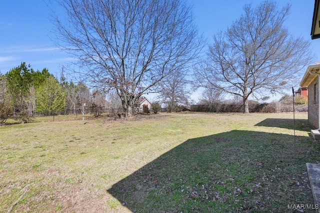 view of yard featuring fence