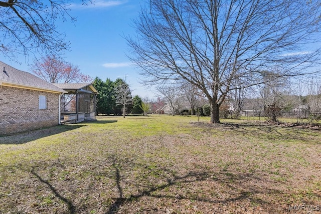 view of yard featuring fence