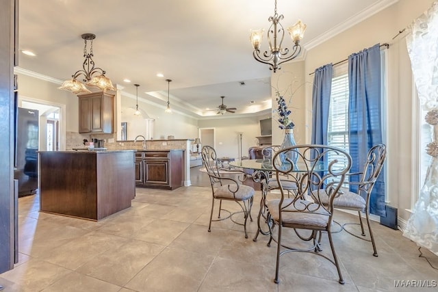 dining area with crown molding, light tile patterned floors, ceiling fan with notable chandelier, and recessed lighting