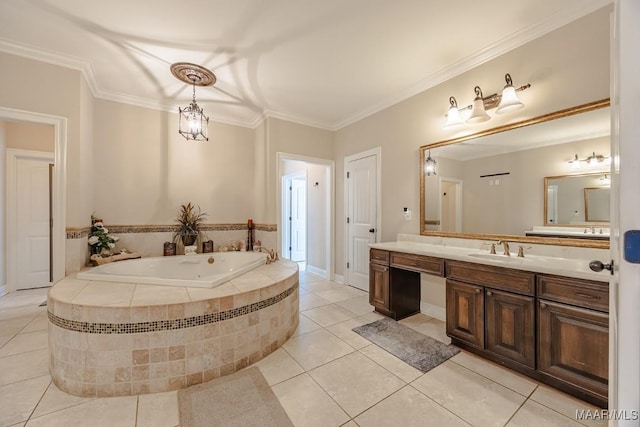 bathroom with tile patterned floors, vanity, a whirlpool tub, and crown molding