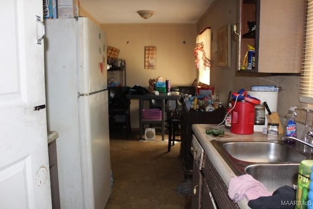 114 Rotary St, Montgomery, AL 36110 - kitchen with freestanding refrigerator and a sink