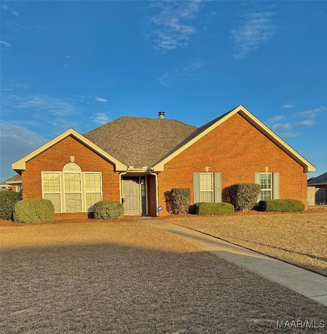 ranch-style home with brick siding