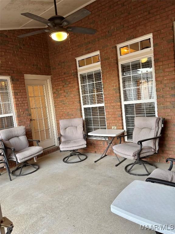 view of patio featuring ceiling fan