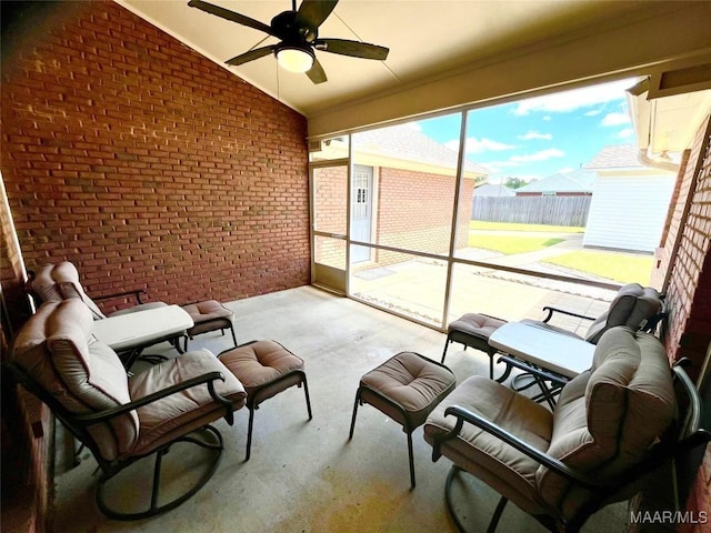 sunroom / solarium with lofted ceiling