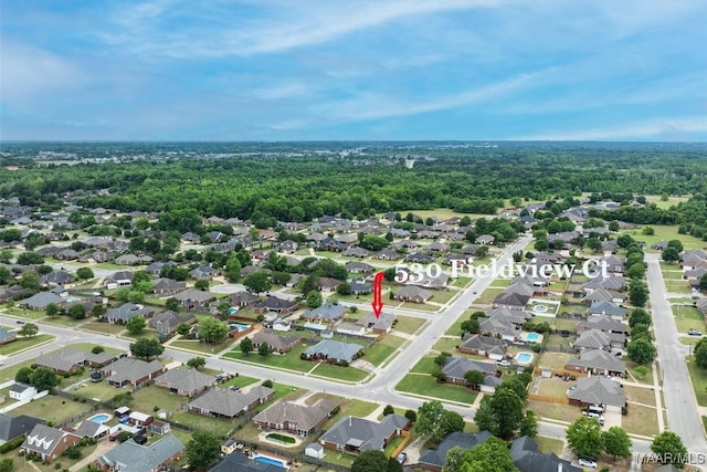 view of property location featuring nearby suburban area