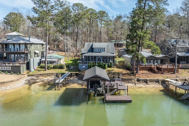 view of dock featuring a water view and boat lift