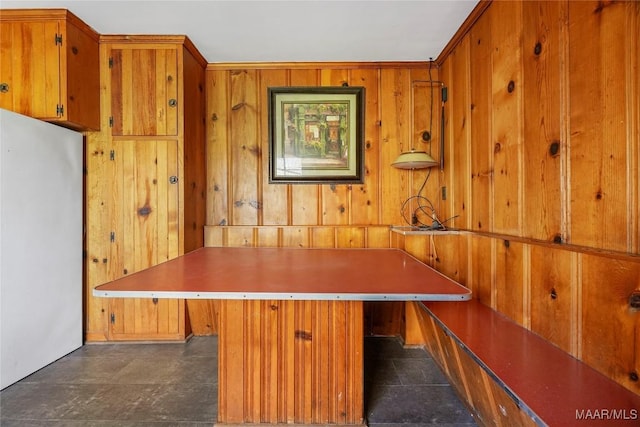 unfurnished office with wood walls