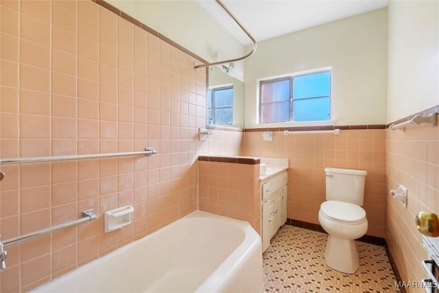 full bath featuring walk in shower, a wainscoted wall, toilet, a bathtub, and tile walls