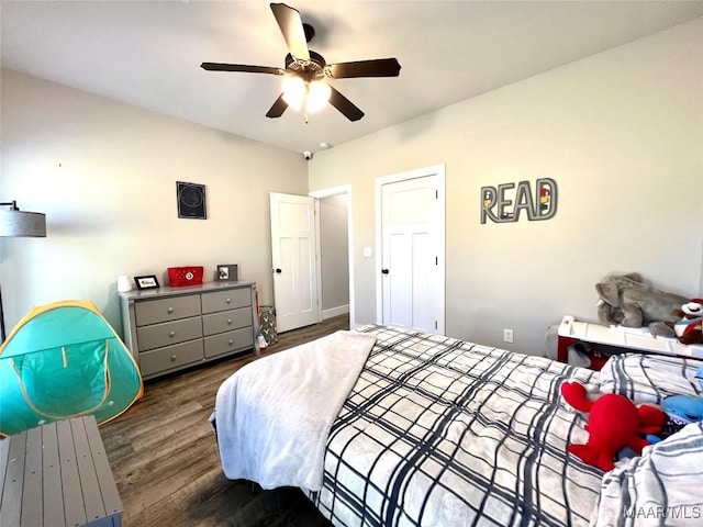 bedroom with wood finished floors and ceiling fan