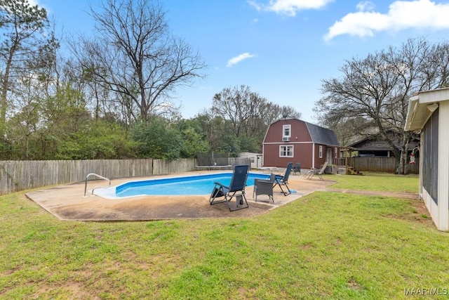 view of pool with a yard, a fenced in pool, a fenced backyard, and a patio area