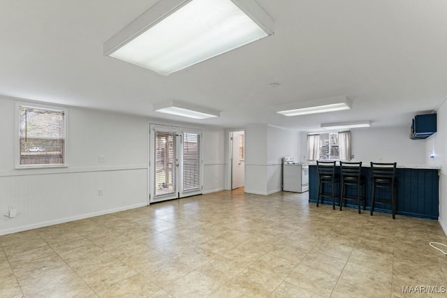 living area featuring plenty of natural light