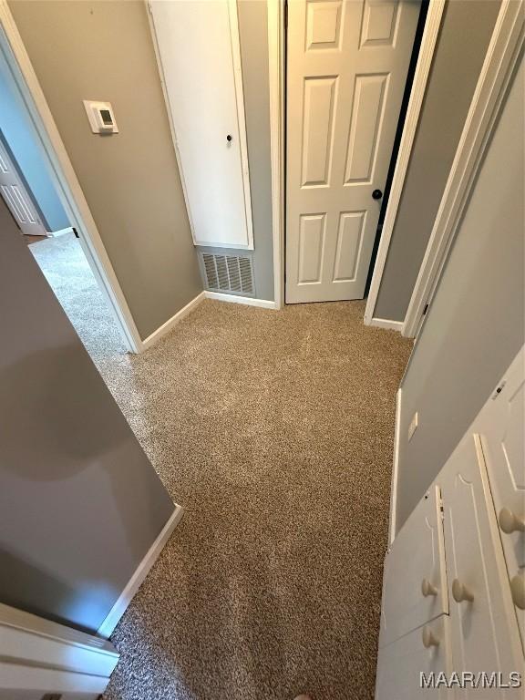 51 High Ridge Rd, Wetumpka, AL 36093 - hall featuring baseboards, visible vents, and carpet flooring