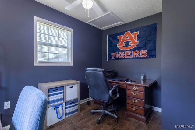 office space featuring wood finish floors, baseboards, and attic access