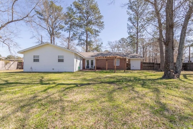 exterior space featuring french doors and a fenced backyard