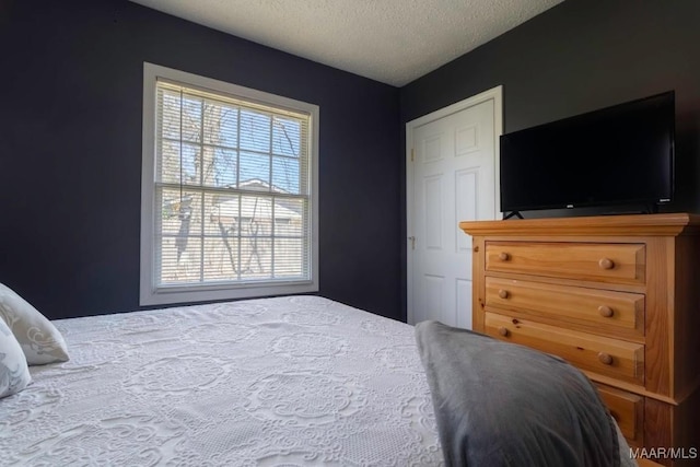 bedroom with a textured ceiling