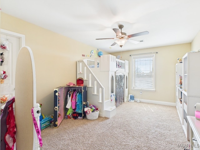 bedroom with baseboards, carpet, and ceiling fan