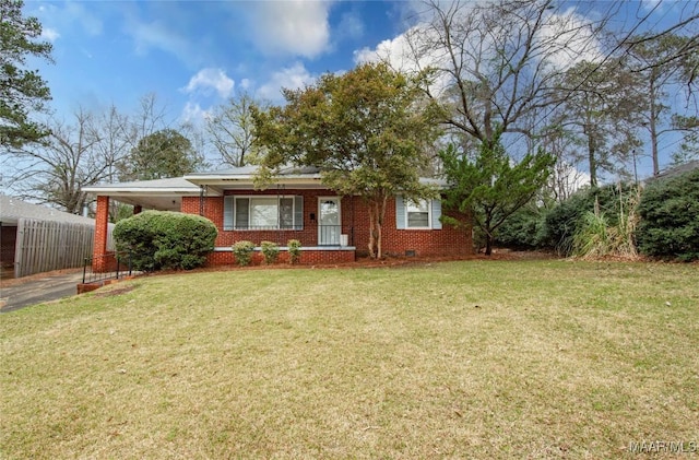 view of front of house with a front lawn, a carport, fence, crawl space, and brick siding