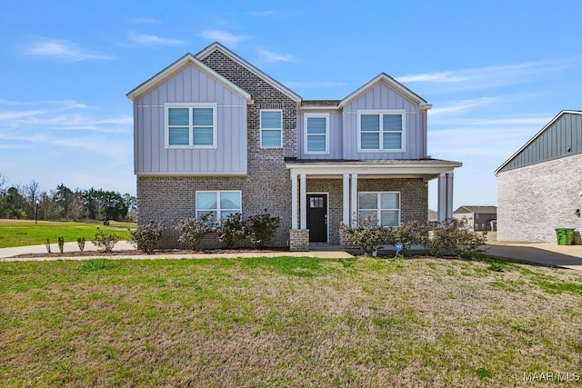 5619 Wyatt Ct, Montgomery, AL 36116 - craftsman house with a front lawn, covered porch, brick siding, and board and batten siding