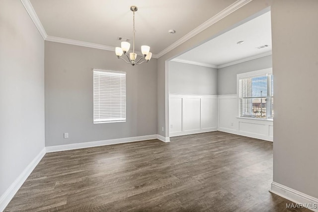 5619 Wyatt Ct, Montgomery, AL 36116 - spare room with dark wood finished floors, visible vents, a chandelier, and crown molding