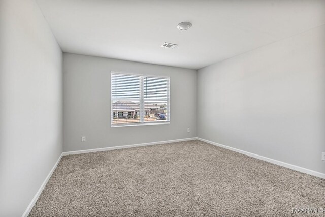5619 Wyatt Ct, Montgomery, AL 36116 - carpeted spare room with visible vents and baseboards