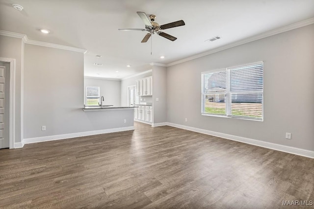 5619 Wyatt Ct, Montgomery, AL 36116 - unfurnished living room featuring a sink, baseboards, visible vents, and ceiling fan