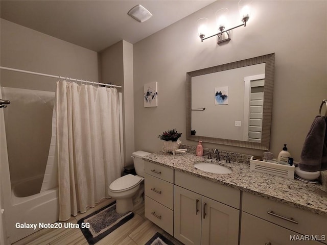 full bath with toilet, shower / tub combo with curtain, and vanity