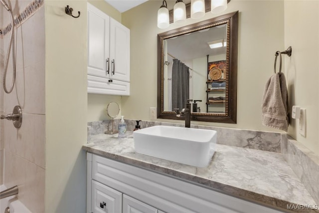 bathroom with vanity and a shower with curtain