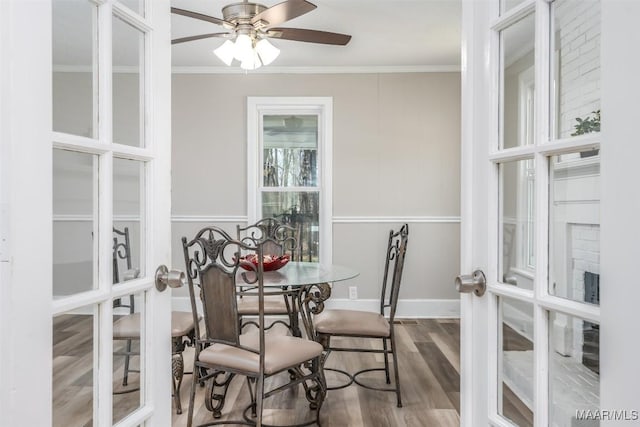 interior space with ceiling fan