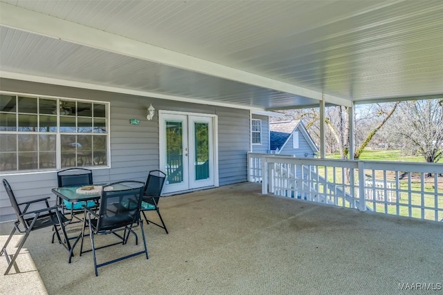 view of patio with french doors and outdoor dining area