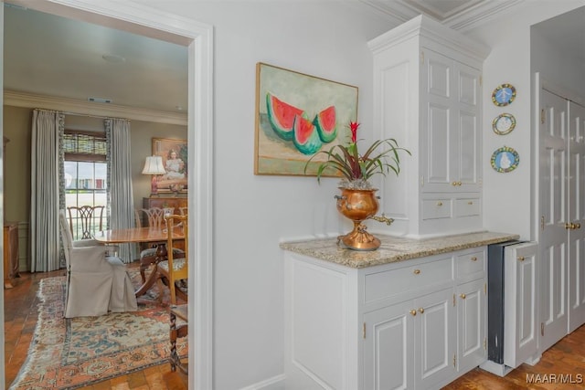 interior space with ornamental molding