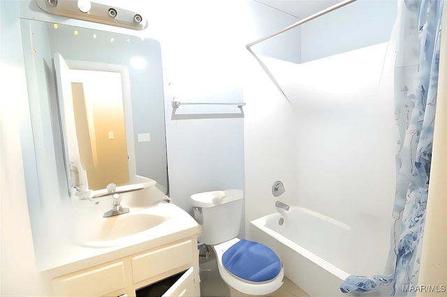 full bath with vanity, toilet, and shower / bath combo with shower curtain