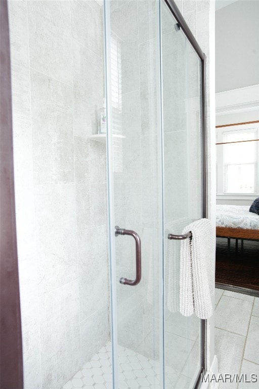 full bath featuring a stall shower and ensuite bathroom